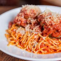 Spaghetti & Meatballs · Spaghetti pasta, basil marinara, homemade meatballs, Parmigiano-Reggiano