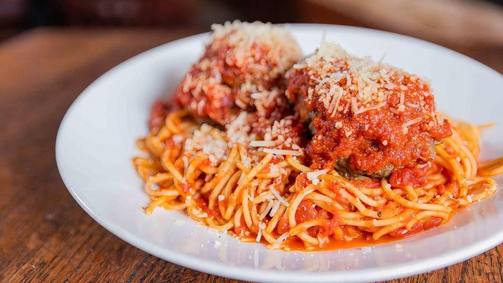 Spaghetti & Meatballs · Spaghetti pasta, basil marinara, homemade meatballs, Parmigiano-Reggiano