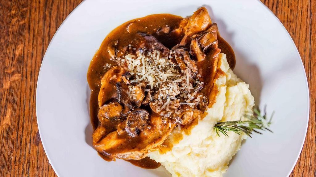 Lunch Chicken Marsala · Sauteed chicken breast and mushrooms, marsala wine demi-glace, shaved parmesan cheese, Yukon mashed potatoes.  (Dinner portion shown)