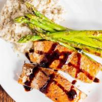 Lunch Herb Encrusted Salmon · Pan roasted Scottish filet, balsamic reduction, grilled asparagus, wild mushroom risotto.  (...