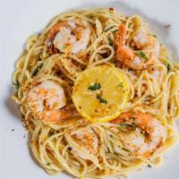 Lunch Shrimp Scampi · Lemon, garlic, shallot butter sauce,  Served with spaghetti pasta.  (Dinner portion shown)