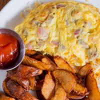 Metropolitan Omelet · Ham, applewood bacon, country sausage, onions, cheddar and Muenster cheeses