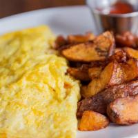Cheese Omelet · Monterey jack, cheddar, Muenster, served with breakfast potatoes or sliced tomatoes