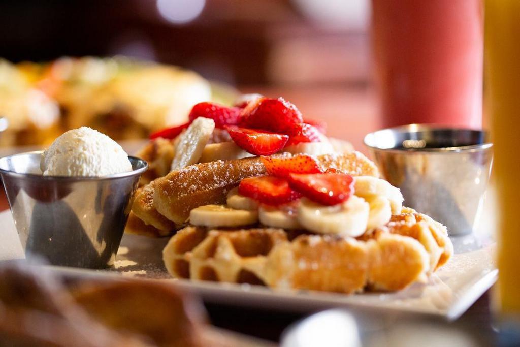 Large Belgian Waffle · 3 rustic Belgian waffles made with sweet pearl sugar, served with syrup and butter