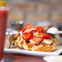 Small Belgian Waffles · 2 rustic Belgian waffles made with sweet pearl sugar, served with syrup and butter
