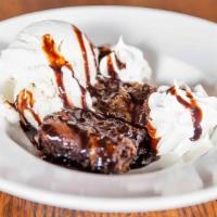 Salted Caramel & Pretzel Brownies · Rich chocolate caramel brownies, salted pretzel crust, caramel cream and chocolate sauce, ve...