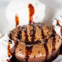 Chocolate Lava Cake · Warm, gooey chocolate cake, chocolate sauce drizzle, vanilla bean ice cream, whipped cream