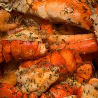 Seafood Lover · 1/2 lb head off shrimp, one cluster snow crab and one piece lobster tail.