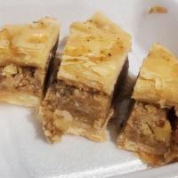 Walnut Baklava · Favorite. Thin layers of filo dough stuffed with walnuts and drizzled with honey syrup.
