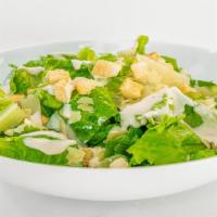 Caesar Salad · Crisp romaine lettuce with garlic croutons, parmesan cheese, and caesar dressing.