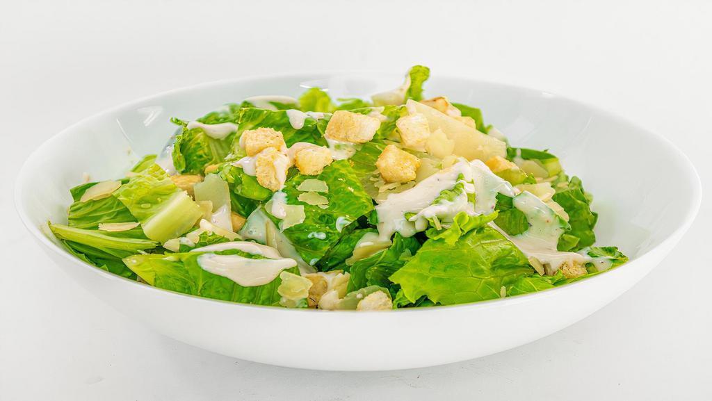 Caesar Salad · Crisp romaine lettuce with garlic croutons, parmesan cheese, and caesar dressing.