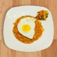 Eomma'S Kimchi Fried Rice · Fried rice with kimchee, spicy seasoning and egg on top.