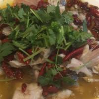 Fish Filet With Sichuan Chili · Spicy. Sichuan most famous style of cooking with special soup sauce over vegetable. This dis...