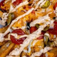 Fuhgeddaboudit Fries · wedge fries, cheddar jack cheese, jalapenos, pepperonis, calabrian mayo, honey