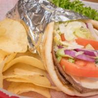 Gyro · Lettuce, tomatoes, onions, tzatziki sauce.  Served on a grilled pita bread.