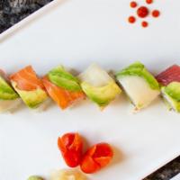Rainbow Roll · Cucumber, avocado, crab meat inside top with tuna, salmon and white fish.
