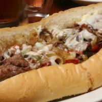 Original Philadelphia Cheesesteak With Onion · Marinated steak or chicken grilled onion and choice of provolone or American cheese