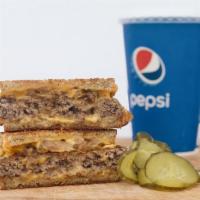 Patty Melt · Topped with friend onions, and served in a grilled cheese.