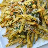 Truffle Parmesan Fries · French fries tossed in truffle oil, seasoned with parmesan and italian spices
