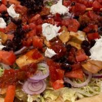 San Jose · New. Seasoned beef, chopped tomatoes, red onions, black beans, and mozzarella cheese topped ...