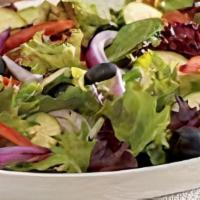 Garden Salad · Mixed greens, tomato, onion, cucumber, carrots.