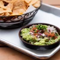 Guacamole · served with corn tortilla chips