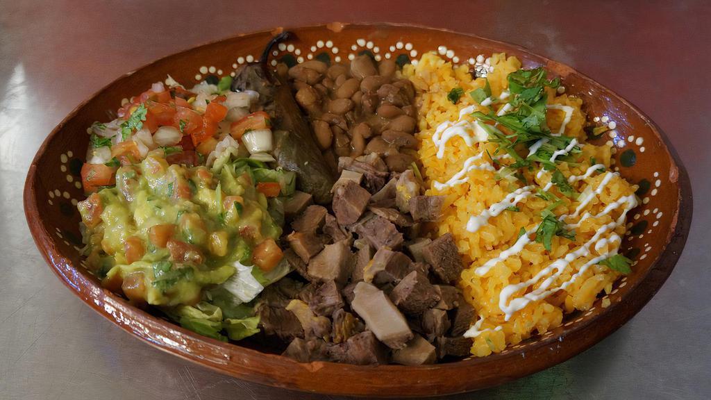 Mix Plate Large · Rice, beans, choice of meat, lettuce, pico, guacamole, cheese & sourcream