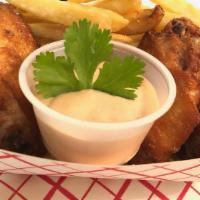 Wings & Fries · It comes with a basket of fries & four chicken wings.