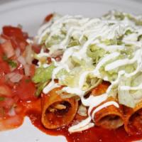 Enchiladas (Red) · Three soft rolled up enchiladas with the option of chicken or beef topped with lettuce, Sour...