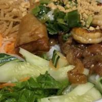 Bun Dac Biet · House special rice vermicelli with combination of spring rolls, shredded pork, charbroiled p...