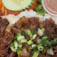Com Tam Thit Nuong · Broken rice with charbroiled pork.