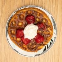 Belgian Waffle · light and crispy Belgian waffle served with a side of maple syrup