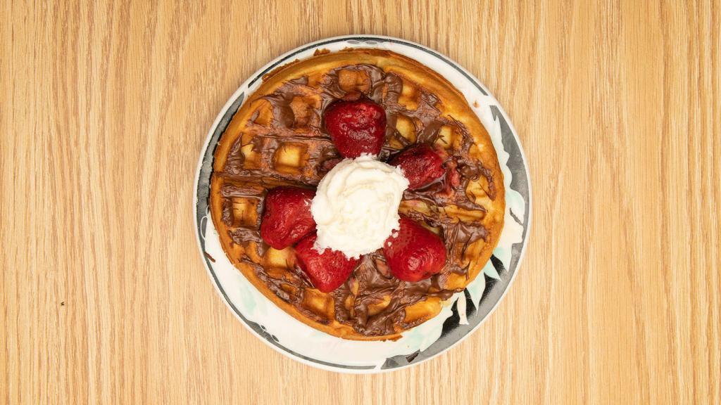 Belgian Waffle · light and crispy Belgian waffle served with a side of maple syrup