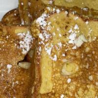 French Toast (2 Slices) · 2 Texas styled french toast served with syrup on the side