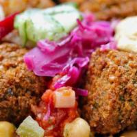 Regular Falafel Bowl · Five balls. Choose your salads/sauces/pickles.  Add a Pita for an upcharge if you wish!