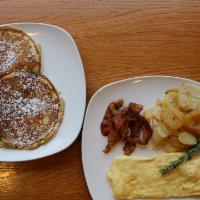 Pancake Deluxe · Two homemade pancakes, two large farm fresh eggs prepared any style, and breakfast meat and ...