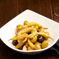 Aceitunas De La Casa Con Guindilla Vasca · Marinated House Olives with Basque Peppers