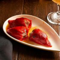 Pimientos Del Piquillo Rellenos · Piquillo Peppers Stuffed with Braised Beef Short. Ribs and Served Au Jus