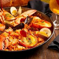 Marinera Con Bogavante Paella(Serves 2-3) · Seafood Paella with Monkfish, Clams,. Mussels, Squid, Scallops, Shrimp & Lobster