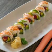 Dancing Shrimp Roll · Salmon, tuna, avocado roll with shrimp on top.