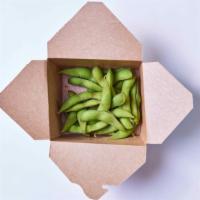 Edamame · Vegan, Gluten-free, and Nut-free. Contains soy. Boiled soybeans served in the pod make a del...