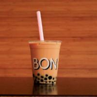 Milk Bubble Tea · Contains milk. Creamy and sweet iced black tea with tapoica pearls.