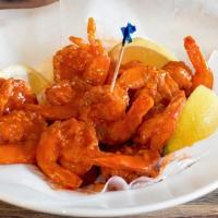 Buffalo Shrimp (5) · Jumbo shrimp coated in seasoned flour, then deep fried to golden brown perfection, tossed in...