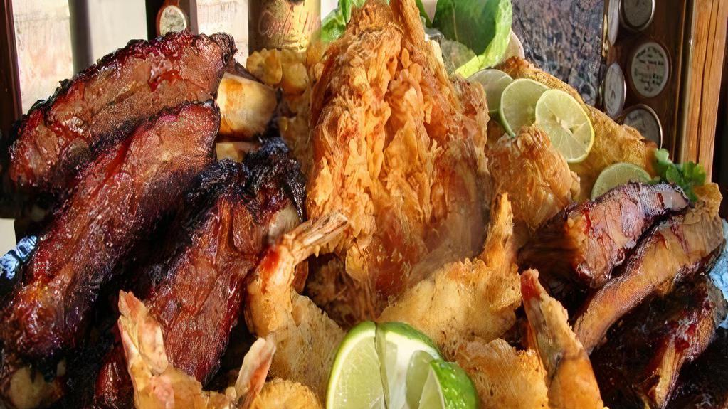 3 Bbq Ribs, 2 Whiting · So juicy, succulent, finger-licking good pork ribs and fried whiting fillet combo. Served with two side dishes and choice of bread on the side.