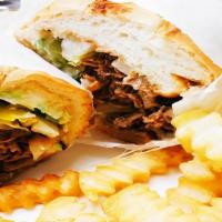 Philly Cheese Steak Sub · Rib Eye Steak and melted Provolone cheese on a toasted sub roll.