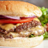 Cheeseburger Sandwich · 1/2LB. Fresh brisket angus ground beef patty and melted double American cheese on a toasted ...