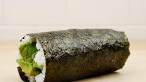 Avocado Makiritto · Slices of avocado in a handheld sushi roll with seasoned sushi rice wrapped in nori seaweed....