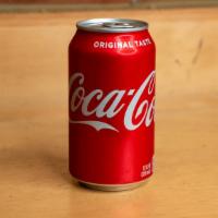 Coca Cola · 12 oz can of Coke.