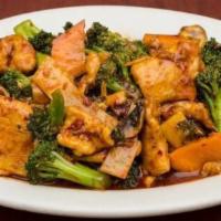 Hunan Chicken · With celery, carrot, bamboo shoot, and mushroom. Spicy.