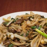 Mongolian Beef · With spring onion and onion.